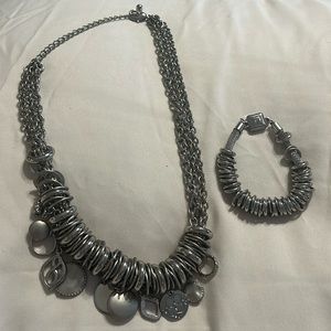 Chico’s -  Silver toned two piece jewelry set.   Necklace and bracelet